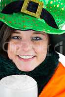 Pretty brunette celebrating Saint Patricks day