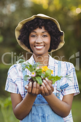 Smiling woman holding flowers
