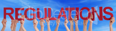 Many People Hands Holding Red Straight Word Regulations Blue Sky