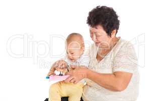Grandmother playing with grandchild