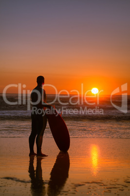 Surfer watching the waves