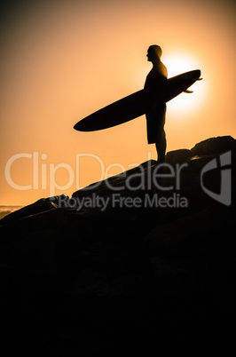 Surfer watching the waves