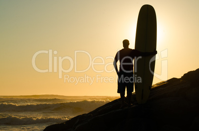 Long boarder watching the waves