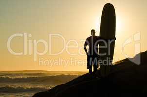 Long boarder watching the waves