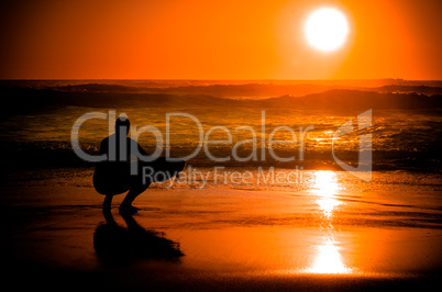 Surfer watching the waves