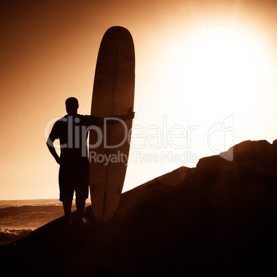 Long boarder watching the waves