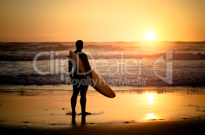 Surfer watching the waves