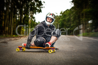 Downhill skateboarder in action