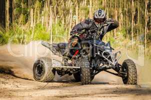 ATV racer takes a turn during a race.