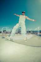 Skateboarder in a concrete pool