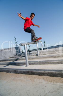 Skateboarder on rail