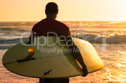 Surfer watching the waves