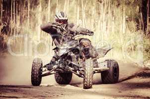 ATV racer takes a turn during a race.