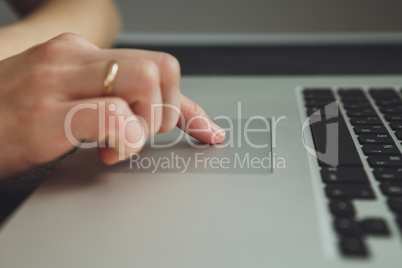 woman's hands working on laptop computer