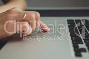 woman's hands working on laptop computer