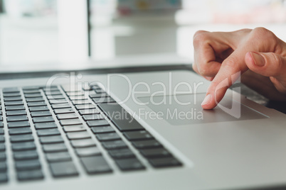 woman's hands working on laptop computer