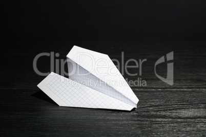 Paper Airplane On Dark