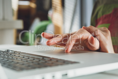 woman's hands working on laptop computer