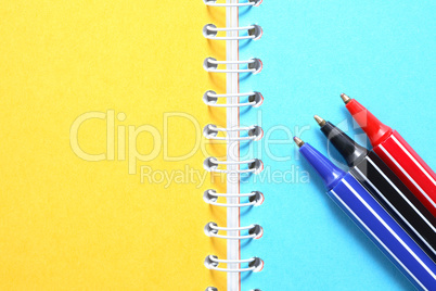 Pens On Notebook