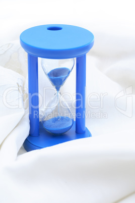 Blue Hourglass On White