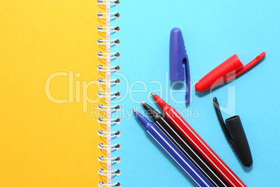 Pens On Notebook