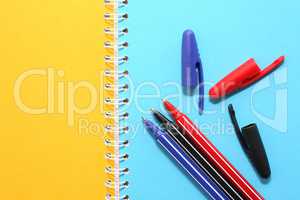 Pens On Notebook