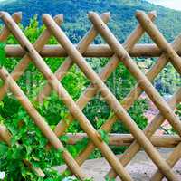 a wooden slatted fencing