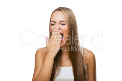Woman yawns of boredom on white background