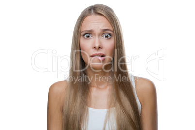 Portrait of shocked woman on white background