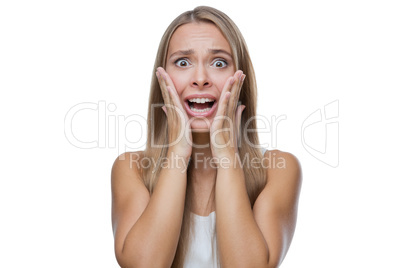 Portrait of surprised woman on white background