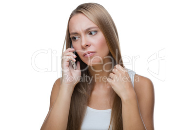 Sad woman talking on phone