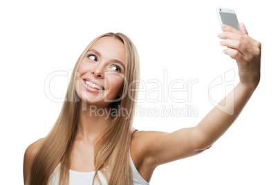 beautiful woman make selfie on white background