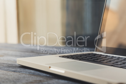 Laptop on modern wooden desk