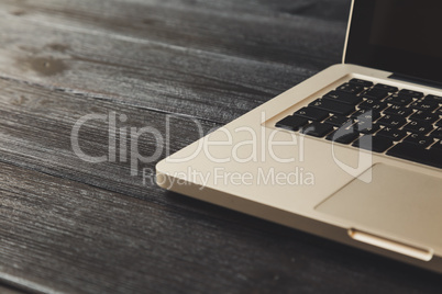 Laptop on modern wooden desk