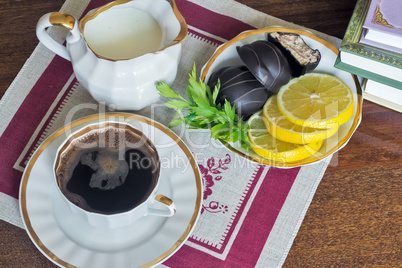 Still life : a Cup of black coffee on the table.