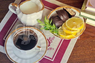 Still life : a Cup of black coffee on the table.