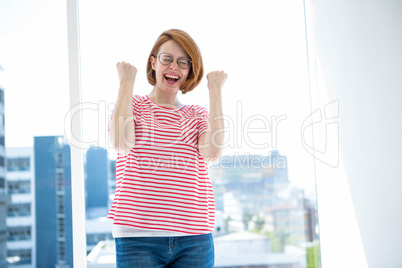 Cute red haired hipster with glasses