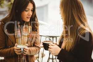 Friends chatting over coffee