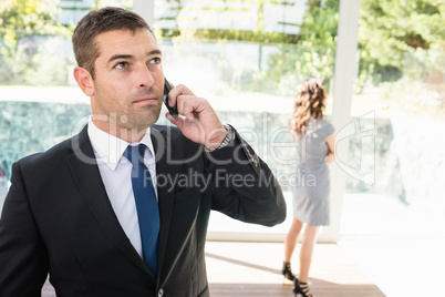 Real-estate agent talking on the mobile phone
