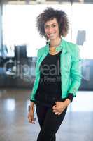 Portrait of young woman in office