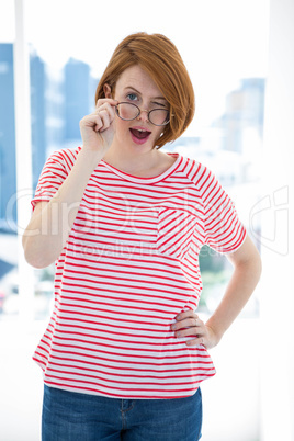 Cute red haired hipster with glasses