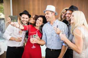 Group of friends taking selfie