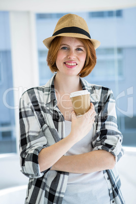 Fashion hipster having a coffee