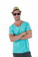 Hipster man posing with sunglasses and hat