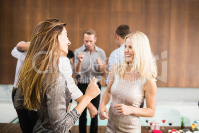 Group of young friends dancing