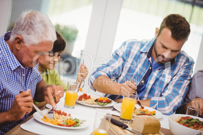 Family having a meal together