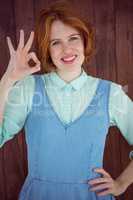 Hipster woman doing the ok sign