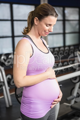 Pregnant woman in sportswear