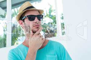 Hipster man posing with sunglasses
