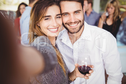 Young friends taking selfie